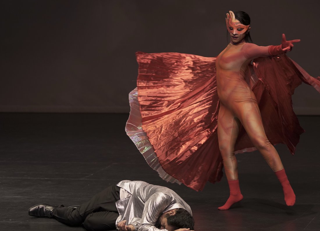 The Silver Poet — dancer with red fabric on stage