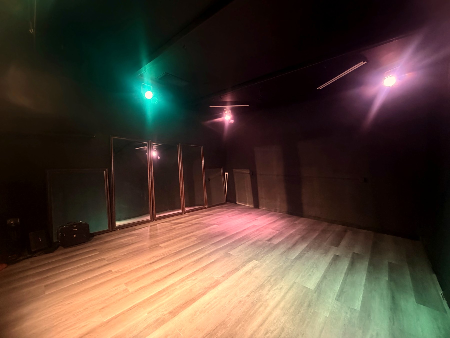 The same room under full colour stage lighting
