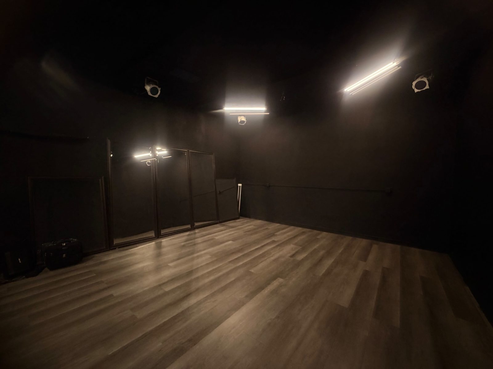 Full view of the YUX Studio black box, house lights on